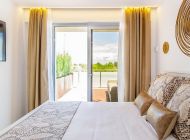 villa-rainbow-schlafzimmer-terrasse-4-doppelbett-terrassenzugang